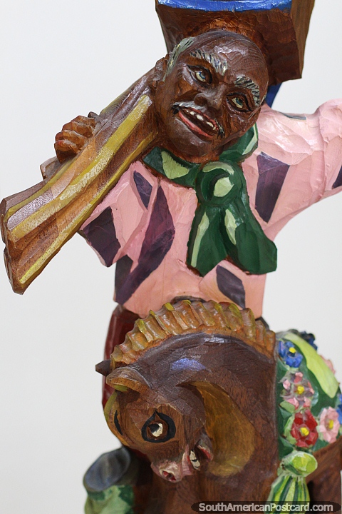 Wooden carving titled the Photographer (1996), carnival museum, Pasto. (480x720px). Colombia, South America.