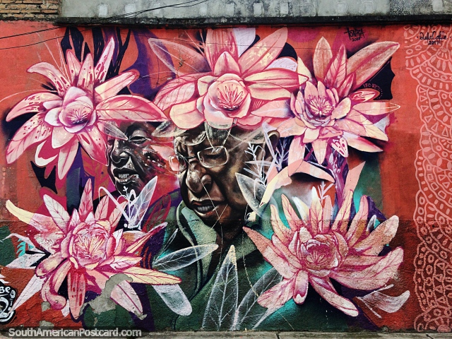 2 people with eyes closed and surrounded by red roses, street art in Pasto. (640x480px). Colombia, South America.