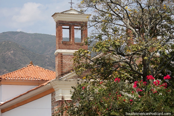 Brick church 'Our Lady of Chiquinquira Temple' blends in well with its surroundings in Santa Fe. (720x480px). Colombia, South America.