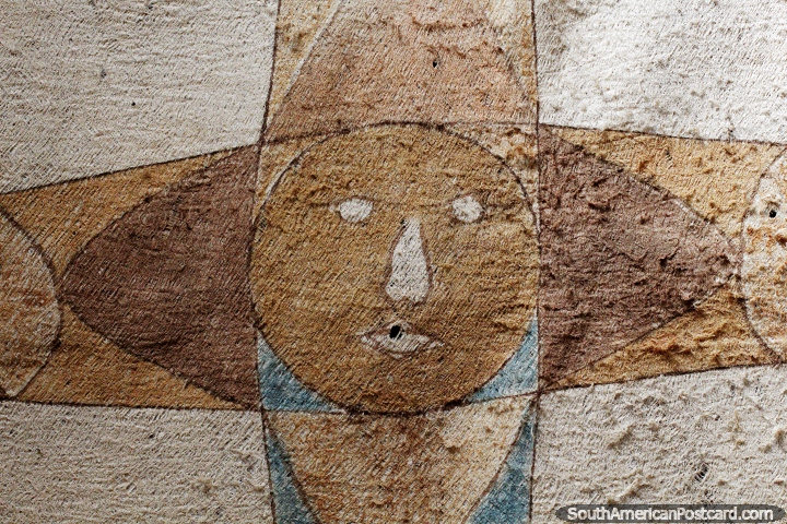 Face and design on a large piece of material at the Mocagua museum in Leticia. (720x480px). Colombia, South America.