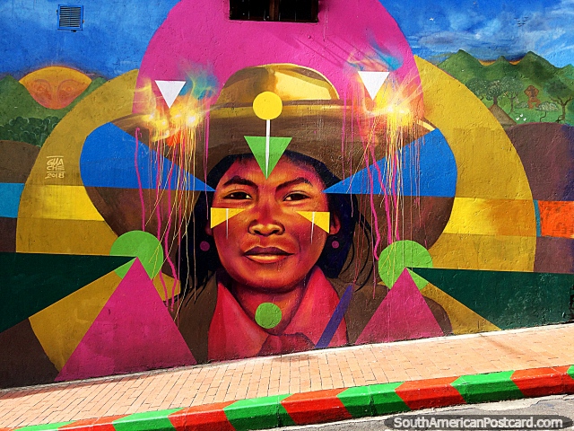 Um indígena de chapéu, sol chovendo, mural de rua em Bogotá. (640x480px). Colômbia, América do Sul.