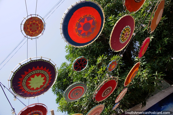 Woven and colorful umbrellas above the street in Riohacha. (720x480px). Colombia, South America.