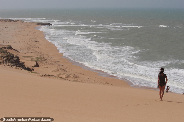 The ocean comes into view at the top of the Taroa sand dunes, Guajira. (720x480px). Colombia, South America.