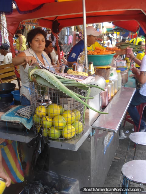 Fresh juices for sale in the markets in Machala. (480x640px). Ecuador, South America.