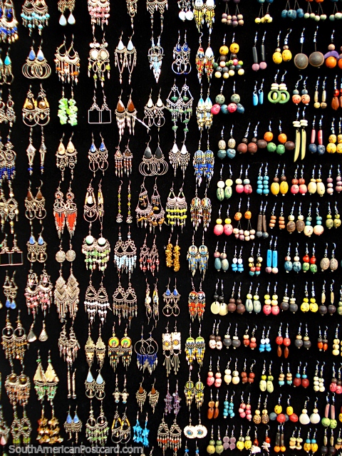 Earrings of amazing detail and color at the Otavalo markets. (480x640px). Ecuador, South America.