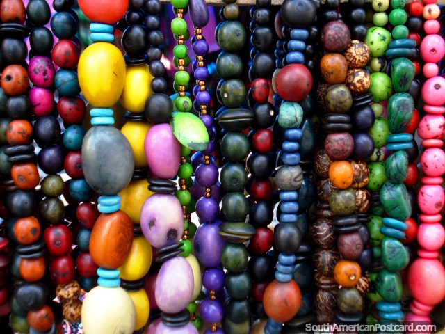 Necklaces and beads made of seeds in amazing colors, Otavalo. (640x480px). Ecuador, South America.