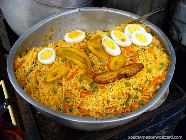 Rice with vegetables, egg and banana ready to eat at Otavalo market. (640x480px). Ecuador, South America.