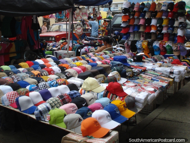 Get your colored cap from this stall in Portoviejo. (640x480px). Ecuador, South America.