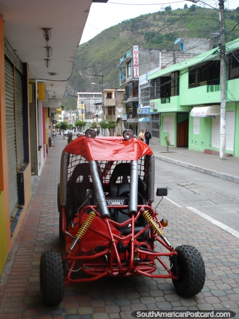 A cool looking buggy for rent on the sidewalk in Banos. (480x640px). Ecuador, South America.