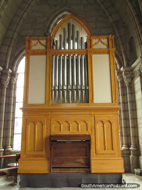 Wooden pipe organ at Basilica del Voto Nacional church in Quito. (480x640px). Ecuador, South America.
