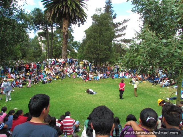 Locals of Quito enjoy entertainment in park El Ejido. (640x480px). Ecuador, South America.