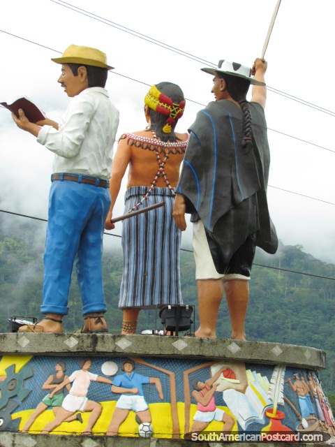The colorful monument of 3 local people of Zumbi. (480x640px). Ecuador, South America.