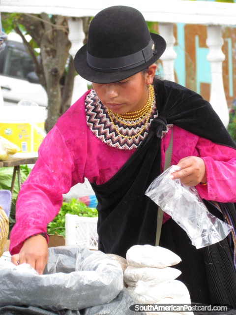 Indigenous woman in pink with black hat at Vilcabamba markets. (480x640px). Ecuador, South America.
