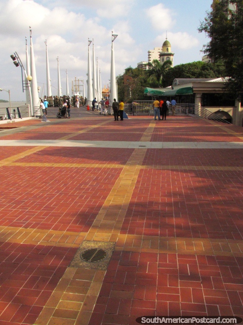 Looking towards the bridge and clocktower on the Malecon in Guayaquil. (480x640px). Ecuador, South America.
