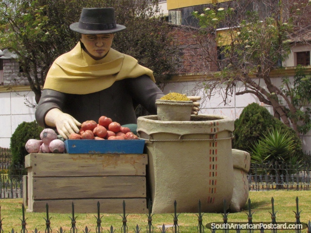 I love the typical monuments of Ecuador, you see them all around the country. Woman with vegetables, Latacunga. (640x480px). Ecuador, South America.