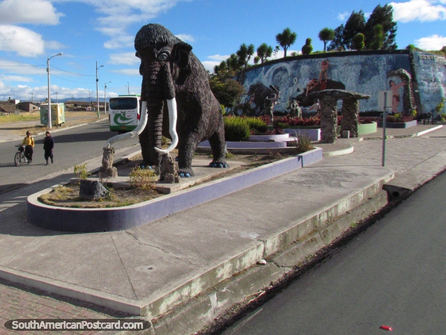 Monument of a mammoth, cavemen and saber toothed tiger around San Gabriel. (640x480px). Ecuador, South America.