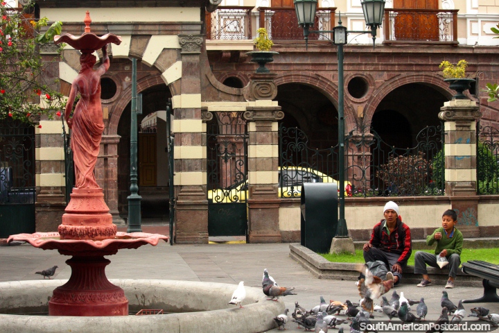 Stone arches, fountain and pigeons at Parque Juan Montalvo in Ambato. (720x480px). Ecuador, South America.