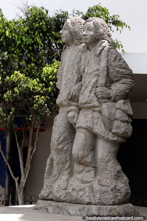 Hope lives on in the hearts of children, stone statue in Guaranda. (480x720px). Ecuador, South America.