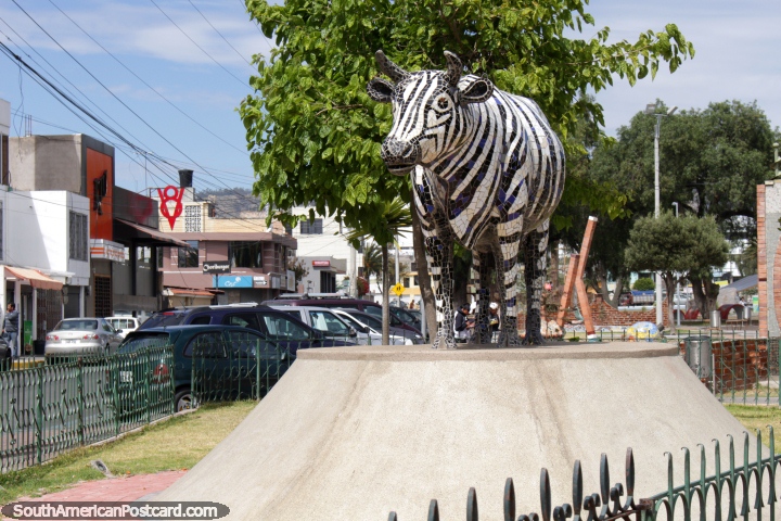 A black and white tiled cow, monument at Parque Guayaquil in Riobamba. (720x480px). Ecuador, South America.