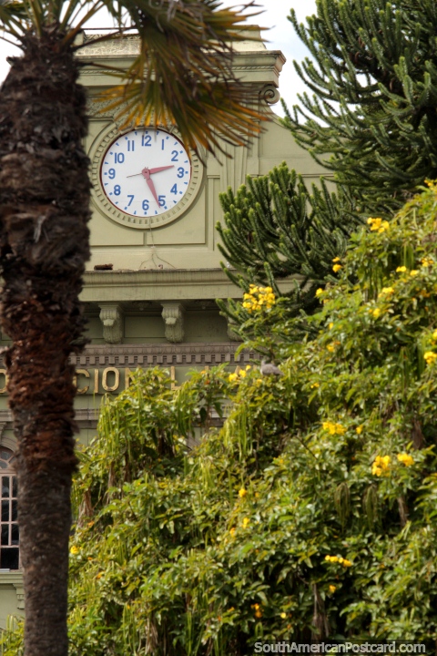 The clock-face at the national college, view from Plaza Sucre, Riobamba. (480x720px). Ecuador, South America.
