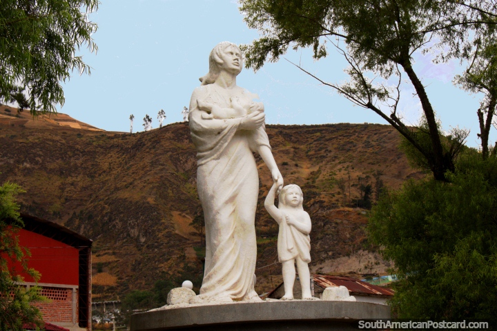 Parque de la Madre in Alausi, Mothers Park, white statue of a mother and child. (720x480px). Ecuador, South America.