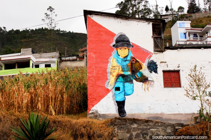 Mural de uma criança em um chapéu em uma casa nas colinas em Alausi. (720x480px). Equador, América do Sul.