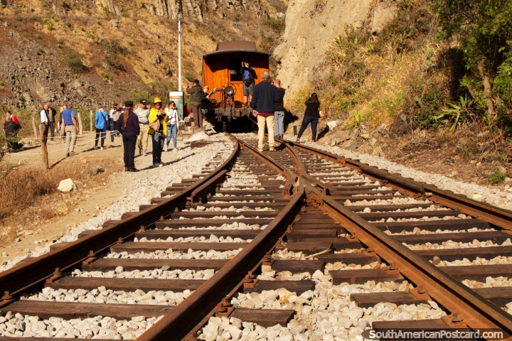 We disembark the train to view the Devils Nose in Sibambe near Alausi. (720x480px). Ecuador, South America.
