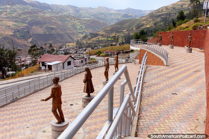 7 un-named gold statues in a plaza high on the hill in Alausi. (720x480px). Ecuador, South America.