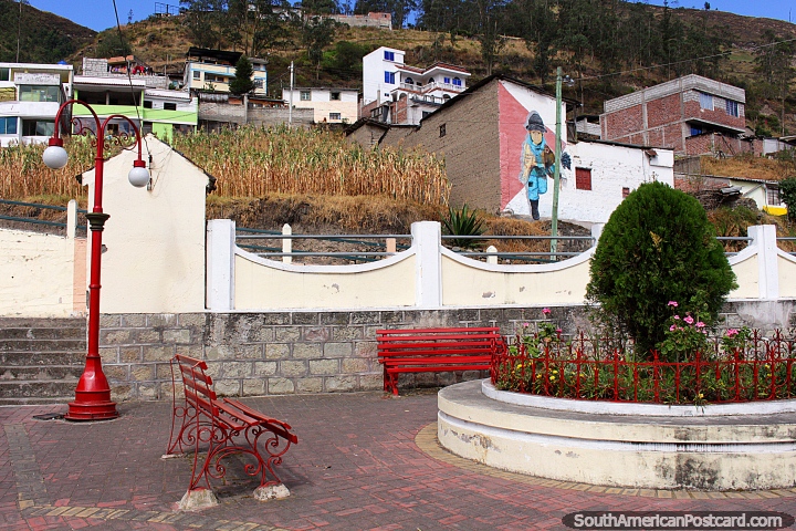 Red seats and lamps, flower garden, Plazoleta 24 de Mayo in Alausi. (720x480px). Ecuador, South America.