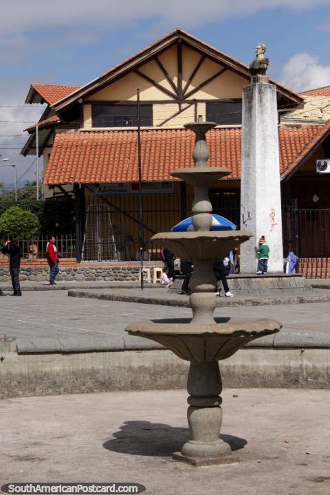 Plazoleta de San Roque, fountain and bust, Cuenca. (480x720px). Ecuador, South America.