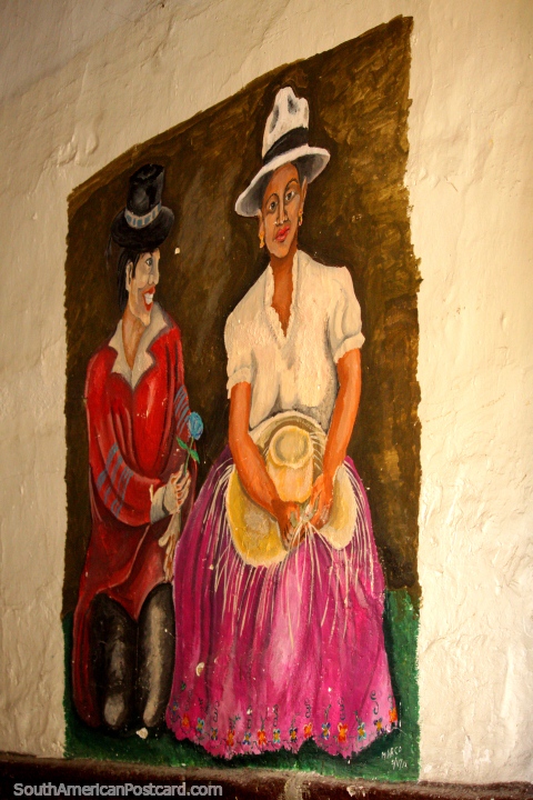 El hombre da a la mujer una flor, bonita pintura en una pared interior de un pasillo en Cuenca. (480x720px). Ecuador, Sudamerica.
