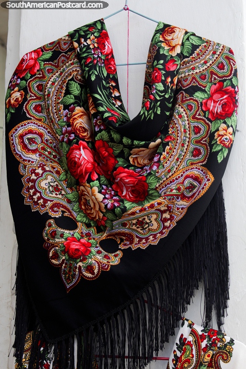 Shawl for women with red roses and nice design at a shop in Ibarra. (480x720px). Ecuador, South America.