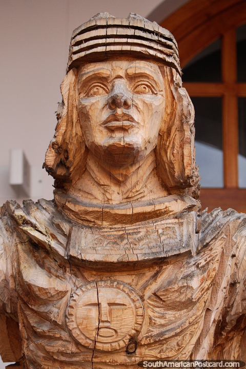 Wood carving created 6kms from Ibarra in San Antonio, man in uniform. (480x720px). Ecuador, South America.