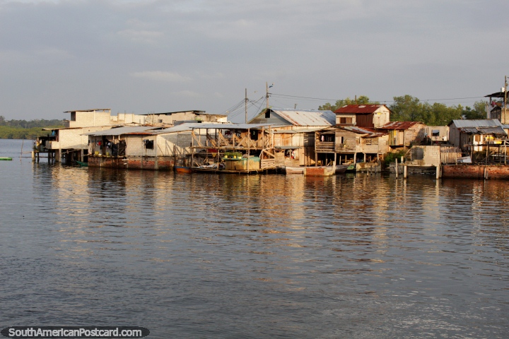 Sunset at the port upon the wooden houses and shacks in San Lorenzo. (720x480px). Ecuador, South America.