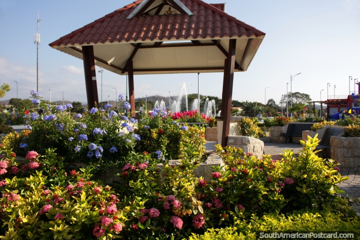 Gardens and flowers with distant fountain in the second park in Jama. (720x480px). Ecuador, South America.