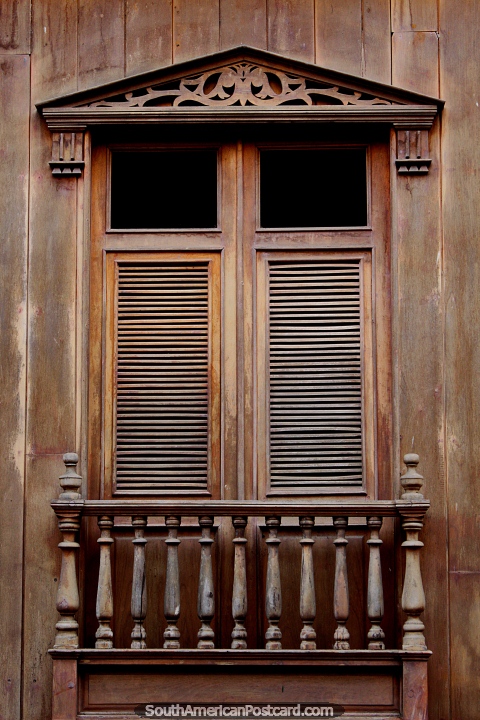 Wooden balcony, doors, windows and shutters, an icon of Zaruma. (480x720px). Ecuador, South America.