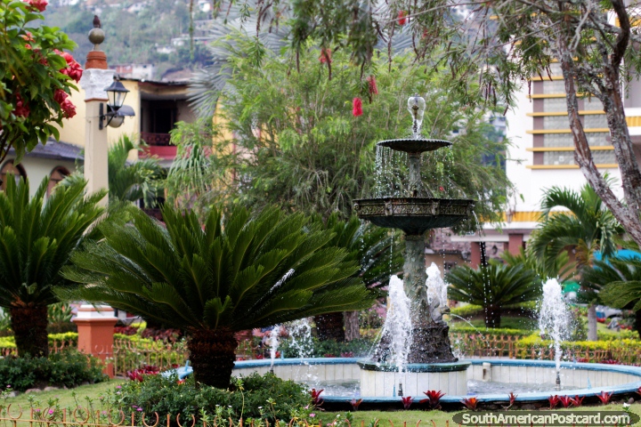 Fountain, palm trees and gardens at Independence Plaza in Zaruma. (720x480px). Ecuador, South America.