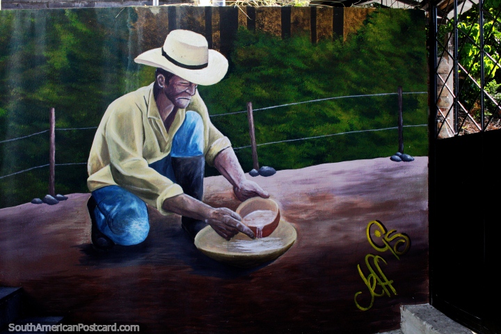 Vaquero en el trabajo preparando comida, buen arte callejero en Zamora. (720x480px). Ecuador, Sudamerica.