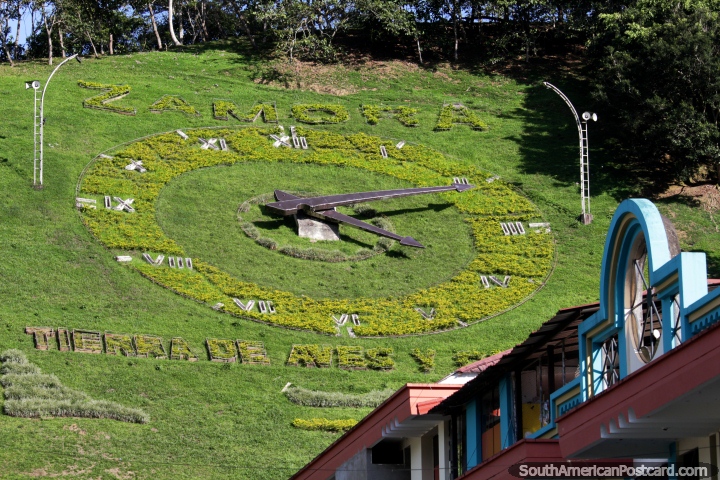 Giant clock in Zamora, some say the biggest clock face in the world, made of grass and metal. (720x480px). Ecuador, South America.