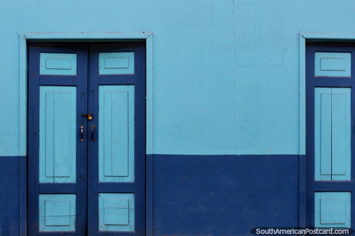 The streets of Limon are characterized by colored wooden doors and buildings. (720x480px). Ecuador, South America.