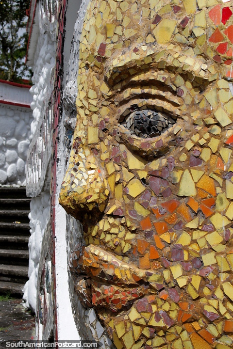 Face of the sun made from colored tiles at Civico Park in Macas. (480x720px). Ecuador, South America.