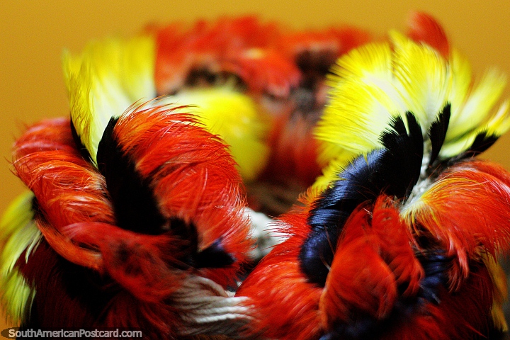 Colored crown made of feathers on display at the Archaeological museum in Puyo. (720x480px). Ecuador, South America.