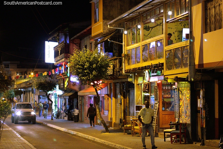 Streets of Banos at night with many restaurants and bars to enjoy. (720x480px). Ecuador, South America.