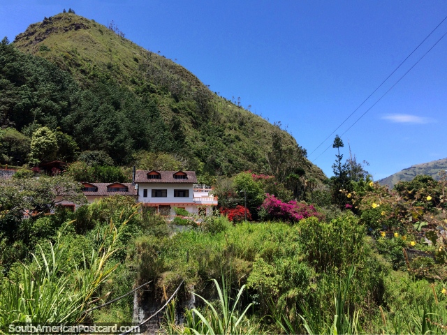 Houses in the beautiful wilderness and countryside on the route of waterfalls in Banos. (640x480px). Ecuador, South America.