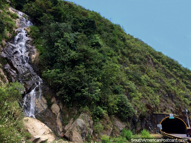 Waterfall beside the San Jorge Tunnel on the route of waterfalls in Banos. (640x480px). Ecuador, South America.