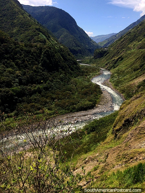 The Pastaza River winds through the valley in Banos, this is not rainy season, imagine that. (480x640px). Ecuador, South America.