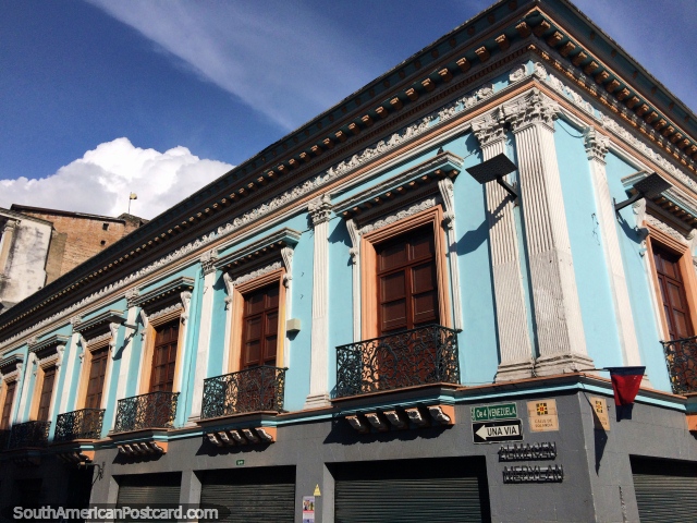Iron balconies and wooden doors, an historic facade in Quito. (640x480px). Ecuador, South America.