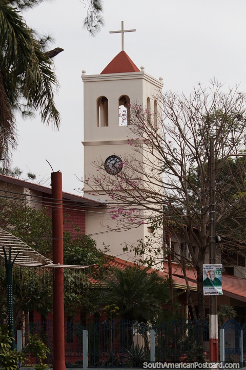 Church tower beside the plaza in Hernandarias. (480x720px). Paraguay, South America.