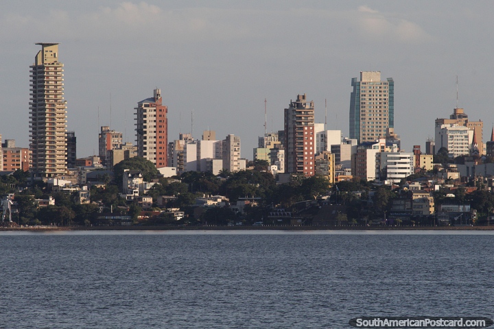 Many buildings in Posadas across the river from Encarnacion. (720x480px). Paraguay, South America.