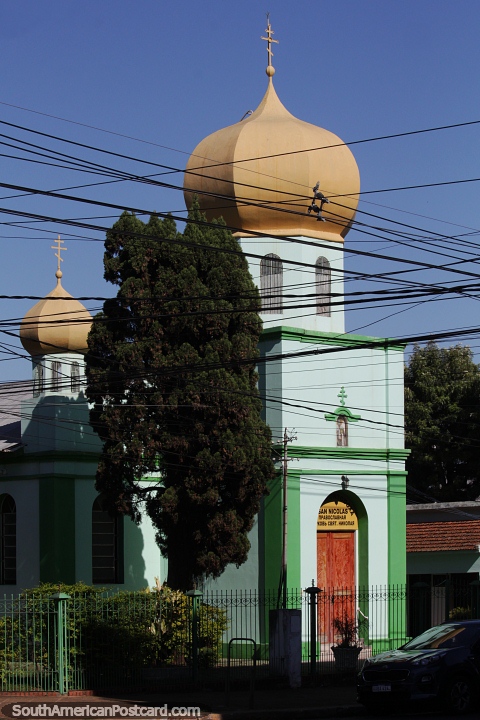 Saint Nicholas Russian Church in Encarnacion, green with gold domes. (480x720px). Paraguay, South America.